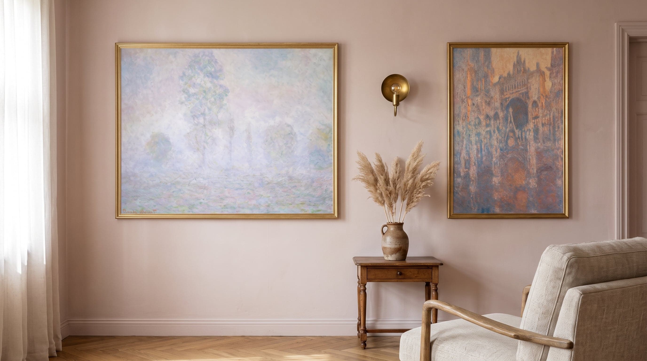 Living room wall with two Monet art prints in mixed sizes, warm light and classic styling.